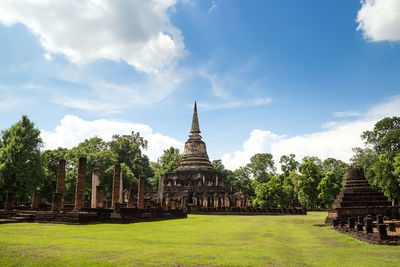 View of temple on building against sky