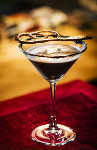 Close-up of wineglass on table