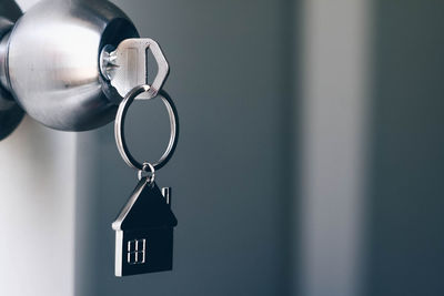 Close-up of key on door