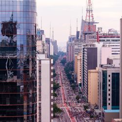 High angle view of buildings in city against sky