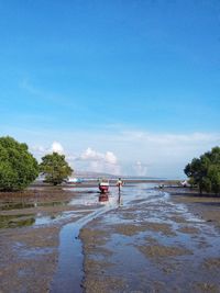 Scenic view of blue sea against sky