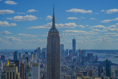 Buildings in city against sky