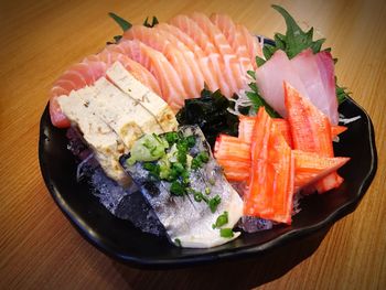 Close-up of sushi served on table