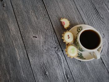 High angle view of coffee cups on table