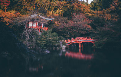 View of bridge over lake during autumn