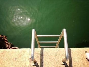 High angle view of swimming pool by lake