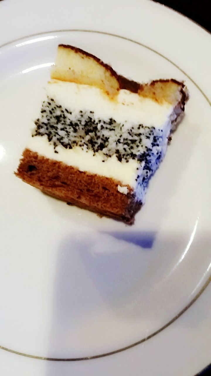 CLOSE-UP OF CAKE SERVED IN PLATE