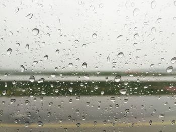 Close-up of water drops on glass