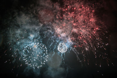 Firework display at night