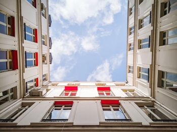 Low angle view of red building against sky