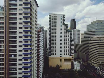 High angle view of buildings in city against sky