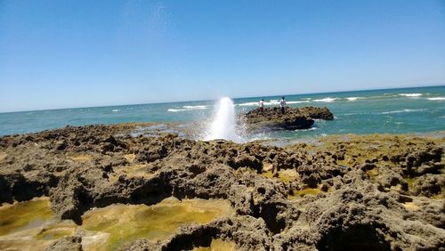 Scenic view of sea against clear sky