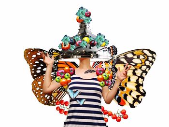 Low section of woman against white background