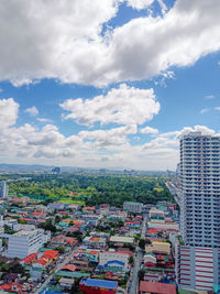 High angle view of buildings in city against sky