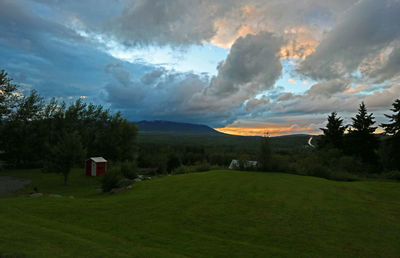 Scenic view of landscape against sky at night