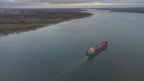 High angle view of ship sailing in sea