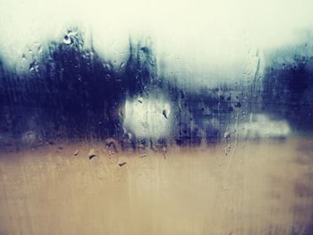 Close-up of water drops on glass