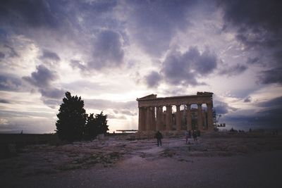 Built structure against cloudy sky