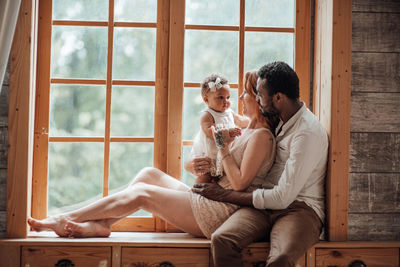 People sitting in a window