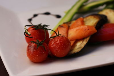 Close-up of strawberries in plate on table