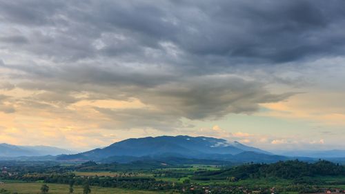 Scenic view of landscape against sky during sunset