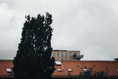 Buildings in city against sky