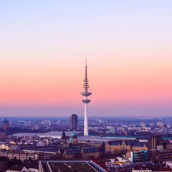 High angle view of city at sunset