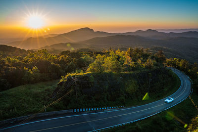 Scenic view of landscape against sky during sunset