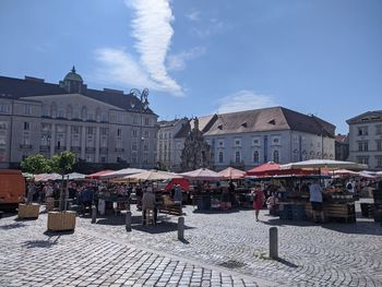 Buildings in city against sky