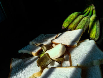 Close-up of bananas against black background