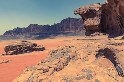 Rock formation on mountain against sky