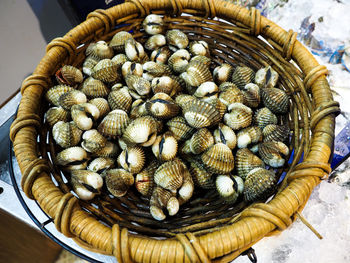 High angle view of eggs in basket on table