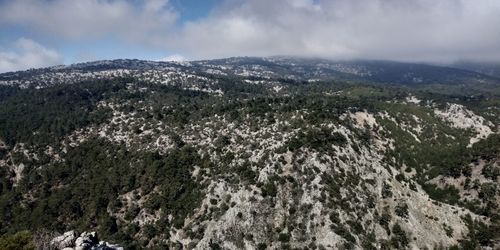 Panoramic shot of mountain range against sky