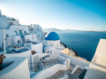 Panoramic view of sea and buildings against sky