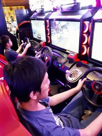 Full length of man using mobile phone