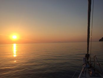Scenic view of sea against clear sky during sunset