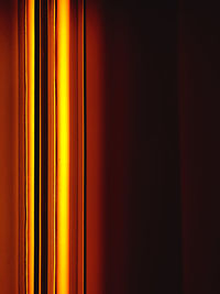 Full frame shot of illuminated orange wall