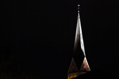 Low angle view of temple against sky at night