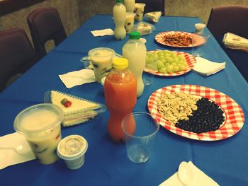 High angle view of snacks and drinks on table