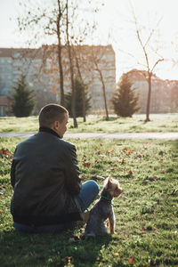 Man sitting on field