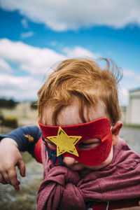 Young kid pretending to be a super hero