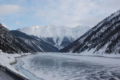 Scenic view of mountains against sky during winter