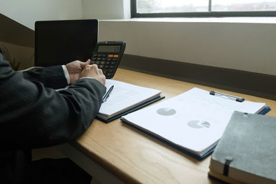 Man using laptop on table