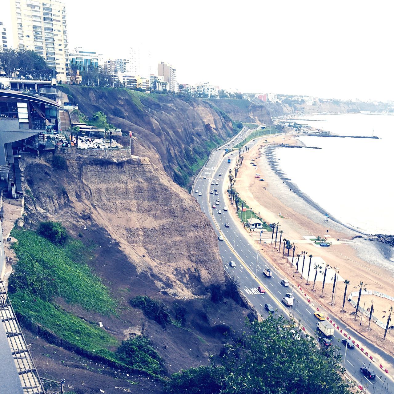 HIGH ANGLE VIEW OF VEHICLES ON ROAD