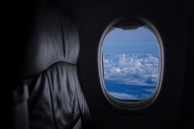 Clouds seen through airplane window