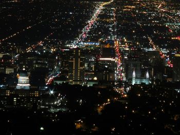 High angle view of illuminated city at night