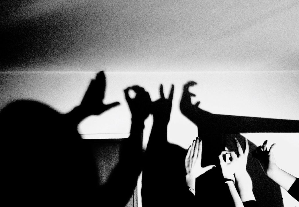 lifestyles, leisure activity, togetherness, men, silhouette, person, indoors, bonding, standing, love, friendship, shadow, communication, text, enjoyment