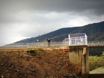 Built structure on land against sky