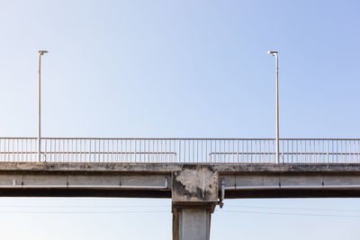 Low angle view of bridge against clear sky