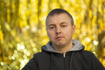 Portrait of young man looking away